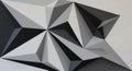 Geometric artwork featuring an array of three-dimensional triangular prisms in shades Royalty Free Stock Photo