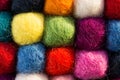 Geometric background with balls of colored synthetic wool Royalty Free Stock Photo