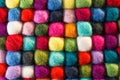 Geometric background with balls of colored synthetic wool Royalty Free Stock Photo