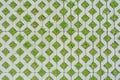 Geometric background of eco floor bricks and green grass. Eco parking texture Royalty Free Stock Photo