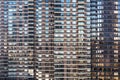 Apartment building background pattern of glass windows in New York City Royalty Free Stock Photo