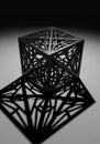 Geometric black cube with an intricate pattern of intersecting lines creating a three- Royalty Free Stock Photo