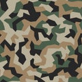 Geometric camouflage. seamless pattern. Abstract trendy army camo. Military urban texture in green brown black colors. Royalty Free Stock Photo