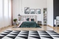 Geometric carpet in bedroom interior Royalty Free Stock Photo