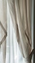 Geometric curtain holdbacks with a mix of sharp angles and soft curves Royalty Free Stock Photo
