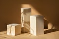 Geometric 3d podiums made of wooden material, arranged in steps on beige background in rays of sunlight. Shadows from