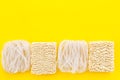 Geometric design with Chinese, Japanese products, noodles, rice vermicelli on yellow background top view mock up