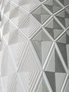 Geometric diamond white patterns and cladding on wall of a moder