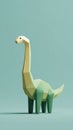 Low Poly Brachiosaurus: A Gentle Giant in Soft Green Tones on Light Blue Background Royalty Free Stock Photo