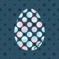 Geometric Easter greeting card with an egg illustration decorated with big and small circles.