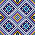 Geometric embroidery tribal seamless pattern. Colorful tapestry ethnic vector background. Waffle decorative design. Beautiful