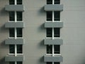 Geometric facade elevation front view of a hotel apartment balconies viewed from the next building window in Penang