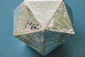 geometric figure icosahedron on the blue background