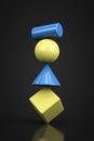 Geometric figures cube, cone, sphere and cylinder balance on each other. Unstable equilibrium