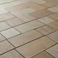 Geometric floor pattern featuring interlocking rectangular tiles in warm beige and tan Royalty Free Stock Photo