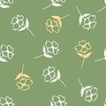 Geometric flowers seamless pattern on green background. Simple style. Doodle floral wallpaper Royalty Free Stock Photo