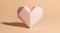 Geometric folded paper heart isolated on warm background subtle romantic Royalty Free Stock Photo