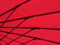 Geometric image of the underside of a red fabric parasol Royalty Free Stock Photo