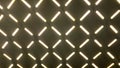 Geometric light pattern on perforated metal ceiling, Banjarmasin, Indonesia, October 2025 Royalty Free Stock Photo