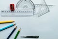 Geometric Measuring tools, Drawing items and mathematical instruments placed on white paper sheet. Back to school and Engineering