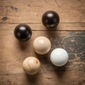 Geometric objects. Wooden spheres on scratched wooden background Royalty Free Stock Photo