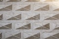 Geometric ornament on the wall. Sgraffito technique. Envelope facade. Royalty Free Stock Photo