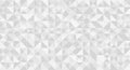 Geometric pattern composed of small, light-gray triangles forming a seamless, repeating mosaic Royalty Free Stock Photo