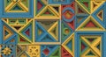 Geometric pattern featuring interlocking shapes in blue, yellow, green, and red hues. Royalty Free Stock Photo