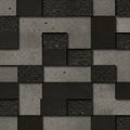Geometric pattern featuring interlocking square tiles with varying textures and