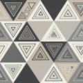 Geometric pattern featuring repeated triangular shapes arranged in a seamless Royalty Free Stock Photo