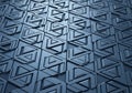 A geometric pattern featuring a series of interlocking triangles and angular shapes in a uniform, Royalty Free Stock Photo
