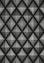 Geometric pattern featuring a series of three-dimensional pyramidal shapes arranged Royalty Free Stock Photo
