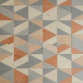 Geometric pattern formed by interlocking tiles showcasing triangles in shades of Royalty Free Stock Photo