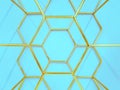 Geometric pattern of hexagons made of metal in gold color on a blue background. Concept background, abstraction Royalty Free Stock Photo