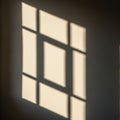 Pattern of light and shadow cast on a beige wall forms a rectangular Royalty Free Stock Photo