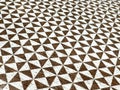 Geometric pattern with repeating triangles on wooden surface Royalty Free Stock Photo