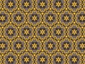 Geometric pattern with yellow stars and brown hexagonal shapes. Royalty Free Stock Photo