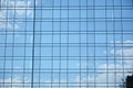 New building in the city center. Glass as a facade of the modern office building. Royalty Free Stock Photo
