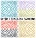 Geometric seamless patterns with decorative ornament of red, blue, green, golden, violet, and black shades on white background Royalty Free Stock Photo