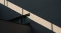 Geometric shadows cast by a structure interact with a building\'s facade, creating Royalty Free Stock Photo
