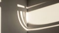 Geometric shadows on a corner of a room, creating patterns of light Royalty Free Stock Photo
