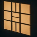 Geometric shadows of a window frame fall on a textured wall. The grid pattern Royalty Free Stock Photo