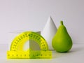 Geometric shapes, protractor, toy pear