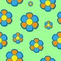 Geometric simple flowers with orange and blue petals and with shadow on a light green background. Seamless pattern Royalty Free Stock Photo