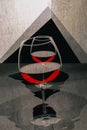 Geometric still life Pyramid with a glass of red wine