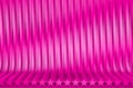 Rendered pink 3D Illustration of abstract background - volumetric surfaces formed by extruded star shape, veterans day or new year
