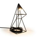 Geometric table lamp with a minimalist design, featuring a triangular metal frame enclosing a Royalty Free Stock Photo