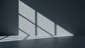 Geometric window light and shadow patterns on a dark grey wall and floor Royalty Free Stock Photo
