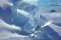 Geometrical formations of blue ice in snow Royalty Free Stock Photo