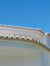 Geometrical lines of retro building with rounded roof in Algarve, Portugal